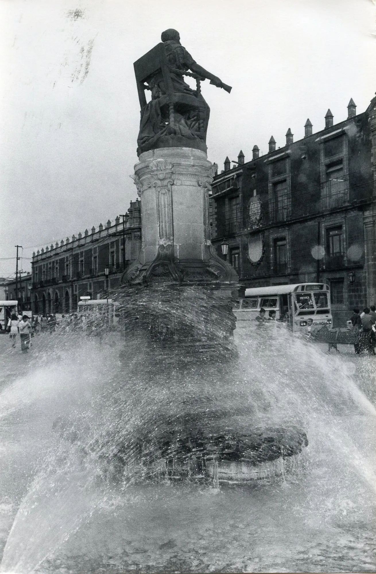 Untitled, Mexico [water fountains around statue in street]